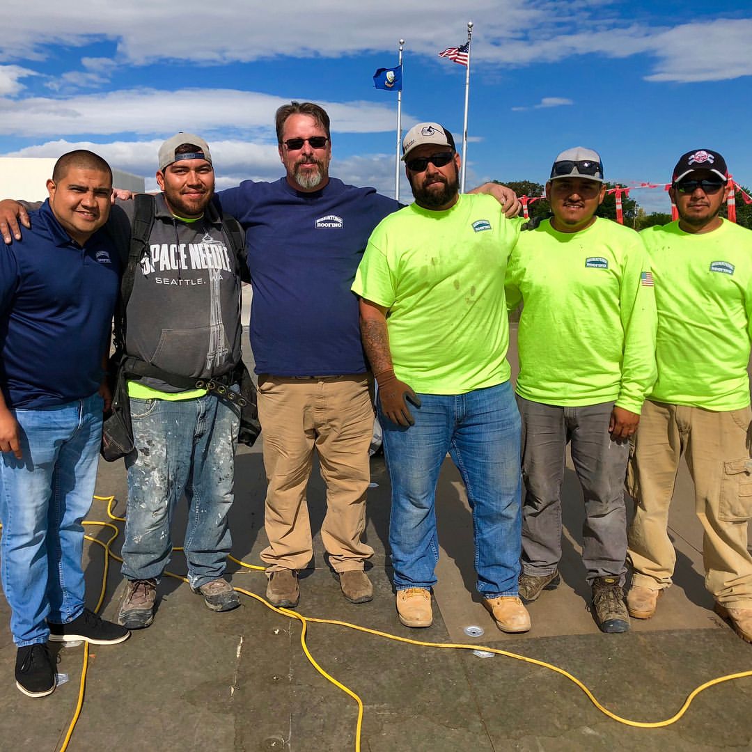 signature roofing team